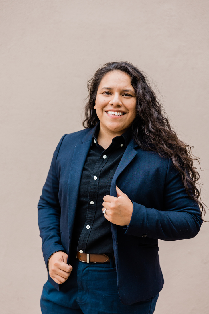 Business Portrait of Young Woman Wearing a Blue Blazer 